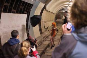 model posing in tube station